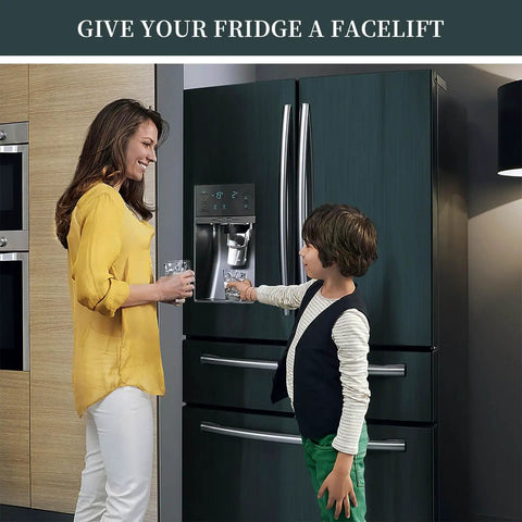 Mother and son in front of dark green fridge with stainless steel look peel and stick contact paper installed for a facelift.