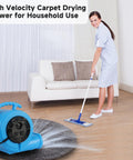 Half HP Carpet Dryer Fan With 2600 CFM Air Blower For Fast Home Drying, ETL Listed, near sofa in living room, with a cleaning person