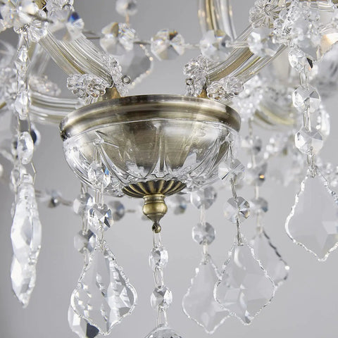 Close-up of Four Light Maria Therese K9 Crystal Chandelier With Antique Brass Finish showing intricate crystal details.