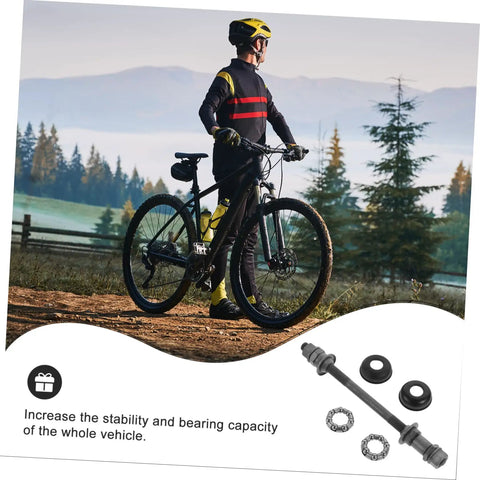 Cyclist with Beefy Heavy Duty Solid Rear Axle Kit for Mountain Bikes, highlighting durability and stability, sleek grey finish.