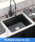 Kitchen scene with silicone sink mat grid protecting glassware and stainless steel surfaces, fits 12 to 30 inch sinks