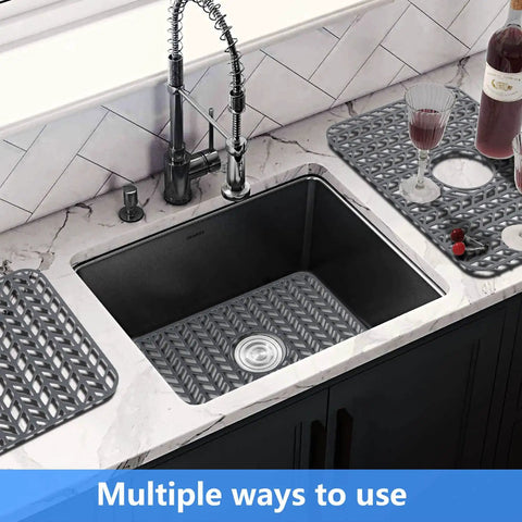Kitchen scene with silicone sink mat grid protecting glassware and stainless steel surfaces, fits 12 to 30 inch sinks