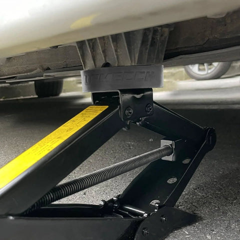 Dual Use Lifting Axle Saddle Adapter Pads, 2 Pack For BMW X3 X5 X6 X7 And Mini, installed on hydraulic jack lifting vehicle