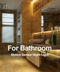 Bathroom with Motion Activated Bed Light With Flexible LED Strip illuminating shelves and vanity, Motion Sensor Night Light For Bedroom, Auto Shut Off Timer, Warm Soft Glow, Energy Saving Bedside Lamp For Late Night Trips And Safe Nighttime Navigation.