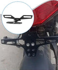 Close-up of Ride Ready Foldable Aluminum Plate Holder For Motorcycle With Rear Light Bracket Universal Mount installed