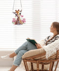 Diamond Painting Hanging Pendant Kit For Adults with giraffe design next to woman reading by window.