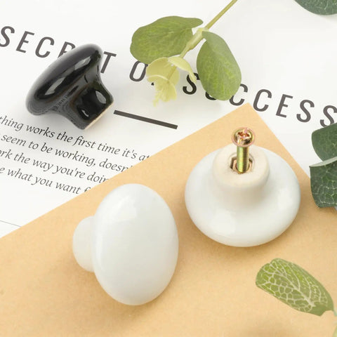 Close-up of 30 Pack White Ceramic Cabinet Knobs Glossy Mushroom Style Drawer Pulls with screw, vintage charm for furniture upgrade.