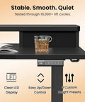 Close-up of Top Shelf Electric Standing Desk 55x26 Inch showing LED display, drink, and drawer, ideal for home office workspace.
