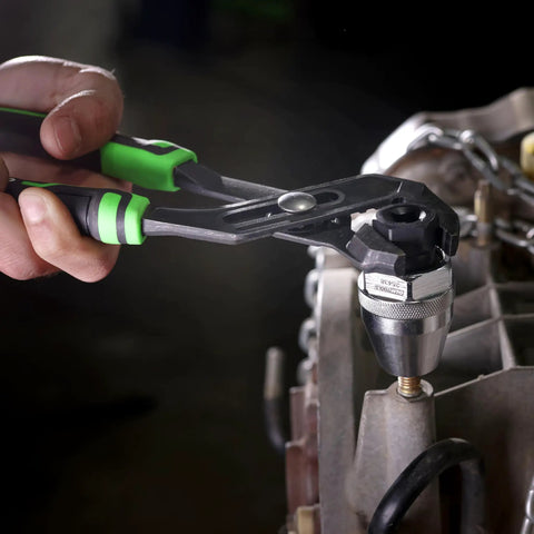 Durable Universal Stud Extractor For Damaged Bolts And Broken Studs, Fits 1/4 To 1/2 Inch Studs, Works On Rusted Bolts And Worn Screws, Manifold Stud Remover, Easy Turn, OEMTOOLS 25438 being used with pliers on engine part.