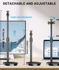 Telescopic Webcam Tripod Desk Mount With Phone Holder, Adjustable 11.4 To 18.7 Inches, shown on desk with height adjust feature.