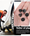 Five Sixteenth Inch Rubber Hydraulic Jack Oil Plugs Five Pack Universal Replacement Bung in hand near jack installation