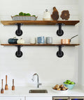 Heavy Duty Industrial Pipe Shelf Brackets Kit For 8 10 12 14 Inch Boards Iron L Pipe Floating Shelves Black 4 Pack in kitchen