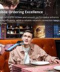 Plug And Chug Android 13 Handheld POS System With Integrated 58mm Thermal Printer used in restaurant for mobile ordering.