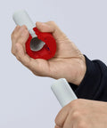 Person using Pipe Cutter For Plastic Pipes 20 To 50 mm That Cuts Without Shavings, Ergonomic Handle on white pipe section