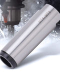 MT4-MT2 Morse taper reducing sleeve; high-speed steel, refined ground finish, silver-gray; side view