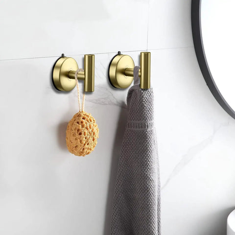 Gold Stainless Steel Suction Hooks For Bathroom And Kitchen with a towel and sponge hanging, heavy duty 15 lb capacity, no drill