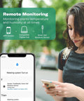 Woman using smartphone to monitor Smart Soil Moisture Sensor with Capacitive Probe and Temperature Meter via app outdoors