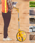 Person using Pro Grade Measuring Wheel With Easy Brake At The Handle And One Touch Zero Reset No Fuss on various terrains