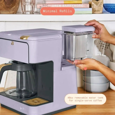 Total Game Changer Multi Brew Coffee Maker 12 Cup Glass Carafe Plus Single Serve Brewer For Pods Or Grounds Brews Over Ice No Fuss Touchscreen Dope Lavender Finish with removable 40oz water tank.