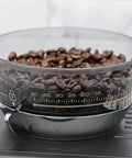 Fully Automatic Espresso Machine With Badass Burr Grinder And Hella Smooth Pulls Featuring Precise Temperature Control Plus Adjustable Milk Frother And Pro Grade 58mm Portafilter For Kitchen Ready Barista Coffee with coffee beans in a transparent bowl.