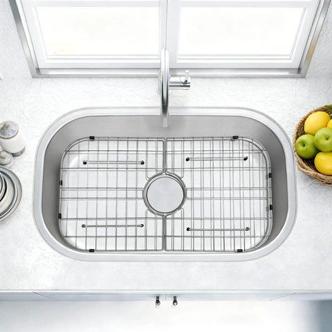 Heavy Duty Foldable Sink Protector Grid With Center Drain And Rounded Corners No Fuss Stainless Steel Drop In Sink Bottom Rack in shiny kitchen sink.