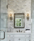 Rustic Wall Sconce Vanity Light With Amber Glow Glass Shade for bathroom, vintage metal fixture, rubbed bronze finish.