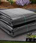 Stacked Heavy Duty Tough As Nails Weed Barrier Fabric 3 Ft By 50 Ft Ground Cover for garden beds, showcasing woven texture.