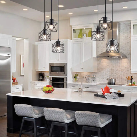 Industrial 3-Light Pendant Light With Black Metal Cage Shade hanging over modern kitchen island, adjustable fixture shown.