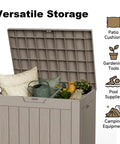 30 Gallon Outdoor Deck Box Lockable Waterproof Storage For Garden Tools Cushions And Pool Accessories Weatherproof Resin Container With Durable Lid And Easy Access For Patio Gear Grey, shown open with contents like pillows and garden tools inside.