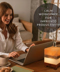 Woman working near Dual Illumination Himalayan Salt Rock Lamp with Real Pink White and Grey Salt Block Dimmer Control Adjustable Glow