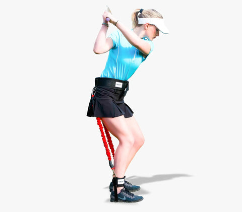Golf Swing Training Aid For Home Range Or Course Boost Driver Distance Iron Precision Ball Spin And Alignment With Tempo Timer Club Sequencing And Putting Practice For Men Women And Kids Indoor Or Outdoor in use by a female golfer