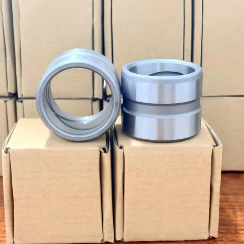 Two Pack 35mm Excavator Bucket Bushing Set 35x45x40mm ID OD L Pivot Pin Sleeve Kit For Heavy Equipment Attachments Easy Install Smooth Fit Wear Resistant Bearings, two gray bushings on boxes
