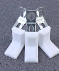 28 Pack White Plastic Corner Brackets For Furniture Reinforcement Anti Slip Desk And Chair Corner Braces Durable Plastic Supports In Gray Background