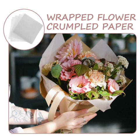 Person holding bouquet wrapped in 50 Sheets White Solid Color Folding Tissue Paper for Flower Wrapping and Florist Packaging