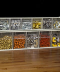 TiltView Plastic Storage Cabinet With Five Tilt Out Bins, Grab And Go Horizontal Parts Organizer filled with hardware items