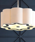 Oil Rubbed Bronze 4 Light Iron Pendant Light With Adjustable Height Scalloped Gray Linen Shade hanging against dark wall