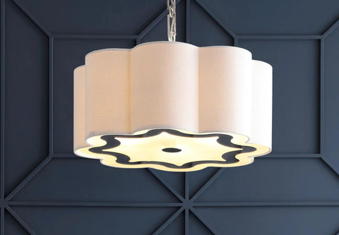 Oil Rubbed Bronze 4 Light Iron Pendant Light With Adjustable Height Scalloped Gray Linen Shade hanging against dark wall
