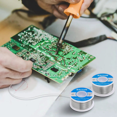Person soldering circuit board using 63-37 Tin Lead Rosin Core Solder Wire for Electrical Soldering, 0.8mm Diameter, 50g Spool