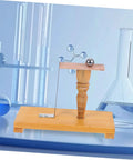 Inertia Demonstrator Pendulum for Science Classroom Teaching and Newtonian Mechanics Experiments Tool on lab bench with glassware