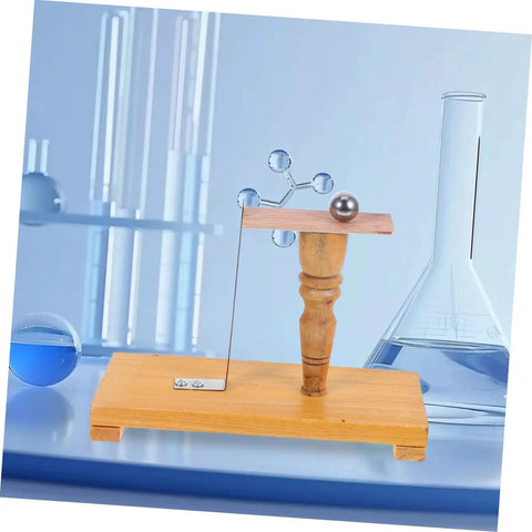 Inertia Demonstrator Pendulum for Science Classroom Teaching and Newtonian Mechanics Experiments Tool on lab bench with glassware