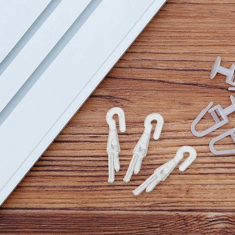 Rock Solid 12 Piece Blind Wand Replacement Hooks Built With Heavy Duty Alloy For Smooth Tilt Action And Fast Window Treatment Repairs Around Your Place on a wooden surface.