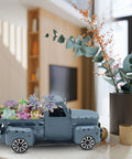 Blue Metal Pickup Truck Decor For Farmhouse Tables with succulents and flowers, showcasing vintage small car ornament style