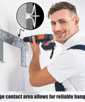 Man using drill to install Drywall Anchor Kit 25 Pieces Plastic Self Drilling Expansion Anchors With Screws And Red Key For Drywall