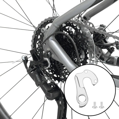 Rear bicycle wheel with focus on Derailleur Hanger Replacement For Trek Specialized Giant Cannondale Bianchi Fuji Diamondback Raleigh Kona Marin And More For Mountain Bikes And Road Bicycles To Restore Precise Shifting And Smooth Performance.