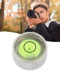 Chiyyak Camera Spirit Level for DSLR and Mirrorless Cameras Compact Stainless Steel Adjustable spirit level with green bubble.