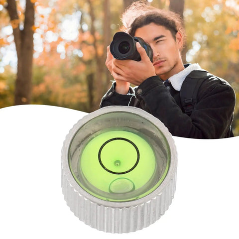Chiyyak Camera Spirit Level for DSLR and Mirrorless Cameras Compact Stainless Steel Adjustable spirit level with green bubble.