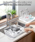 Collapsible Baby Bottle Wash Basin With Built In Drying Rack And Lid Portable 2.4 Gallon Dish Tub in kitchen sink setting