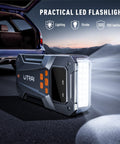 5000A Beast Mode Jump Starter With Air Compressor for 12V Cars and Trucks shown with LED light function in use next to an SUV.