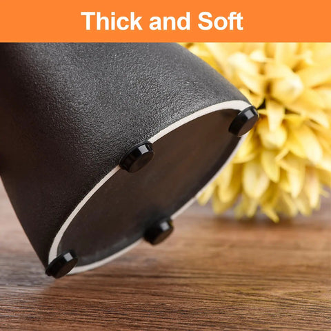 Heavy Duty Self Adhesive Rubber Feet And Bumpers For Electronics 128 Pack showing thick black rubber pads on a surface.