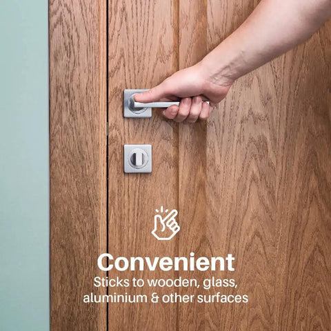 Hand installing Two Pack Kid Friendly Child Proof Door Lever Locks With 3M Adhesive No Drilling Easy Install Minimalist Design
